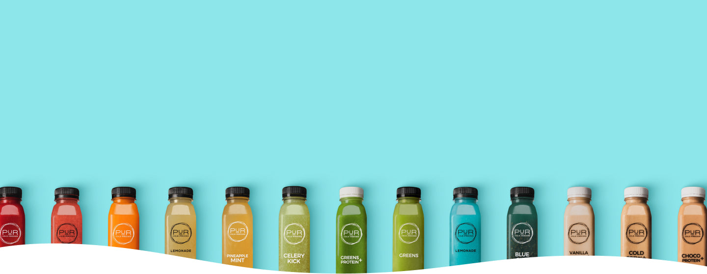 Colorful lineup of PUR Cold-Pressed juice bottles on a bright aqua background, featuring a variety of cold-pressed blends from greens to proteins and mylks.