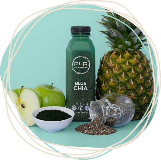 PUR Cold-Pressed Blue Chia juice with pineapple, green apple, chia seeds, and spirulina in a PUR circular frame.
