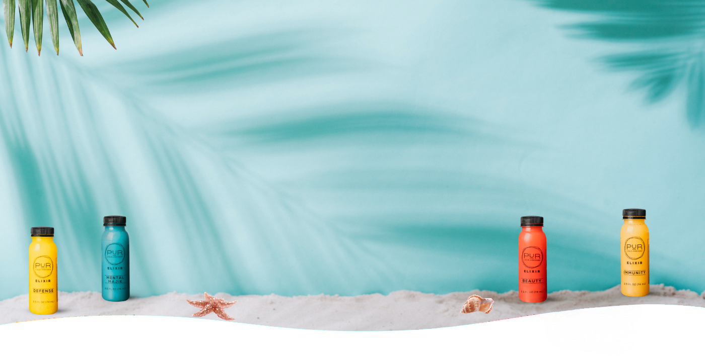 PUR Elixir shots—Defense, Mental Majik, Beauty, Immunity lined up on beach sand with shells and palm shadows.