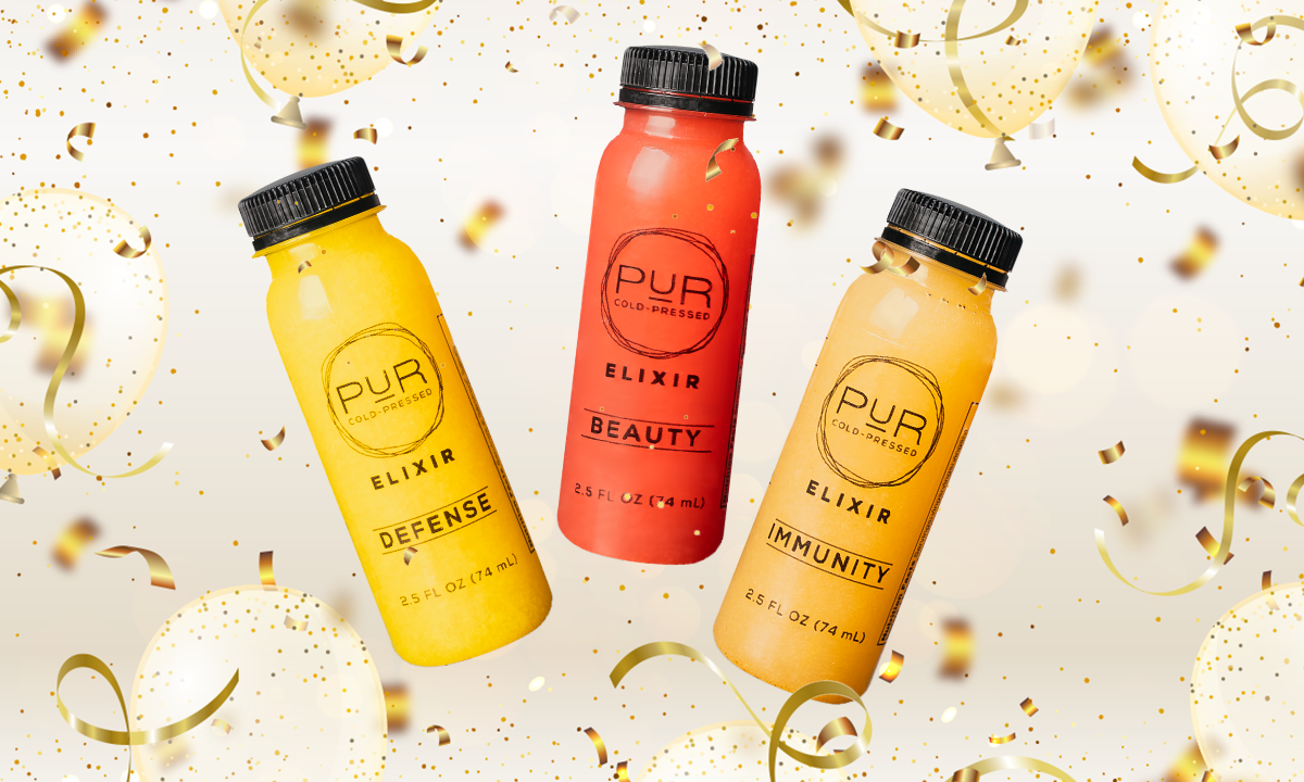 PUR Cold Pressed wellness shots including Defense, Beauty, and Immunity elixirs surrounded by festive New Year confetti