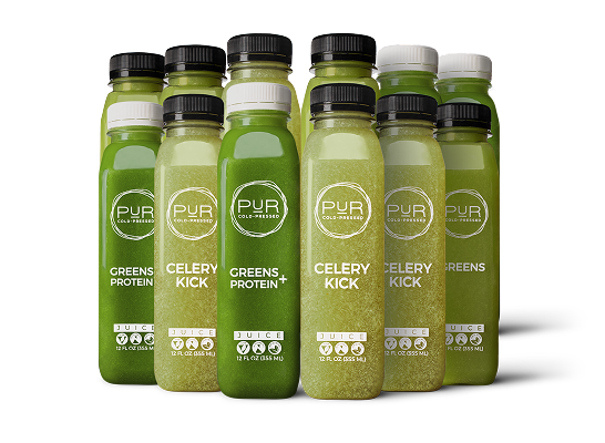 Multiple bottles of PUR Cold Pressed juice Greens + and Celery kick on a white background